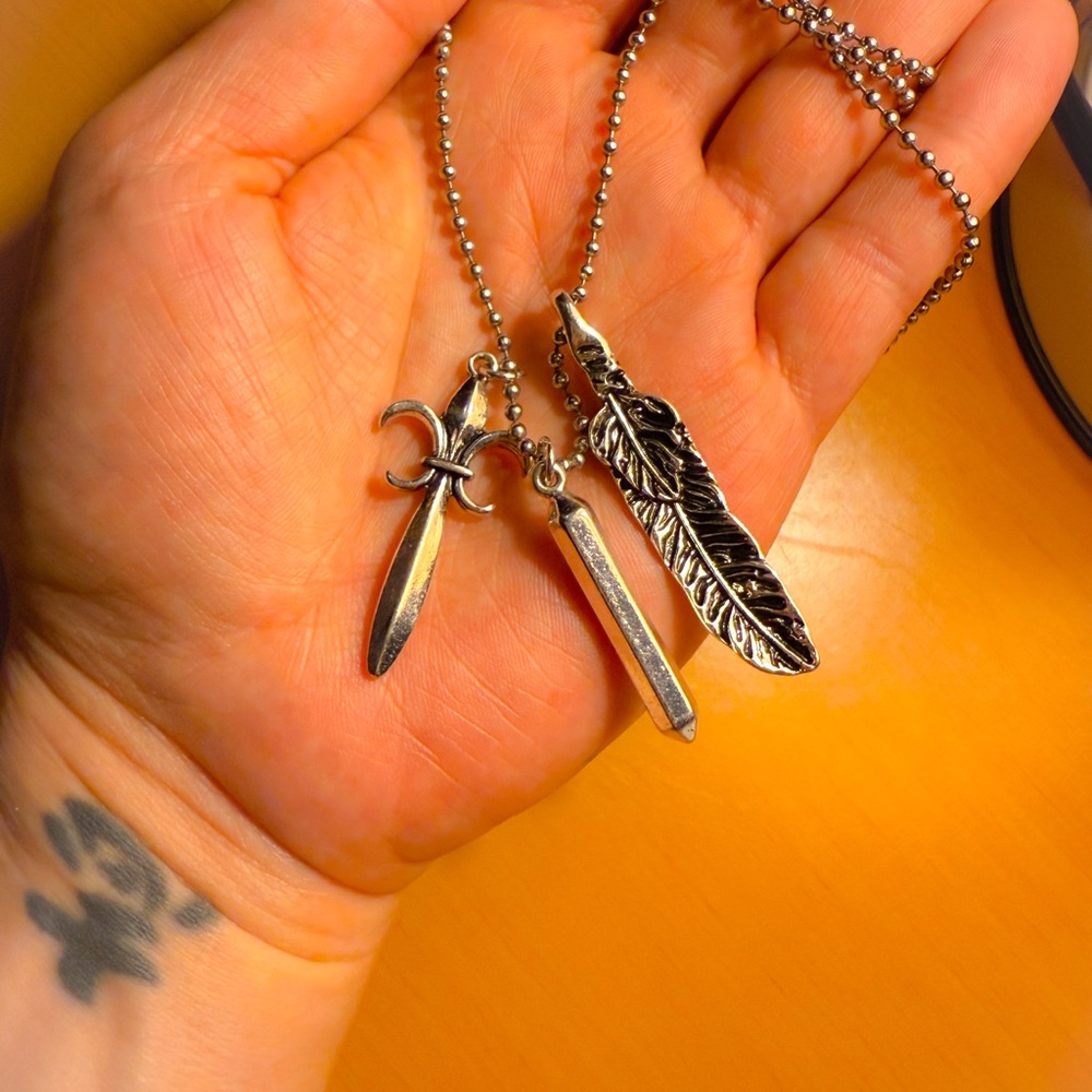 Silver Pendant Necklace with Feather and Sword Charms